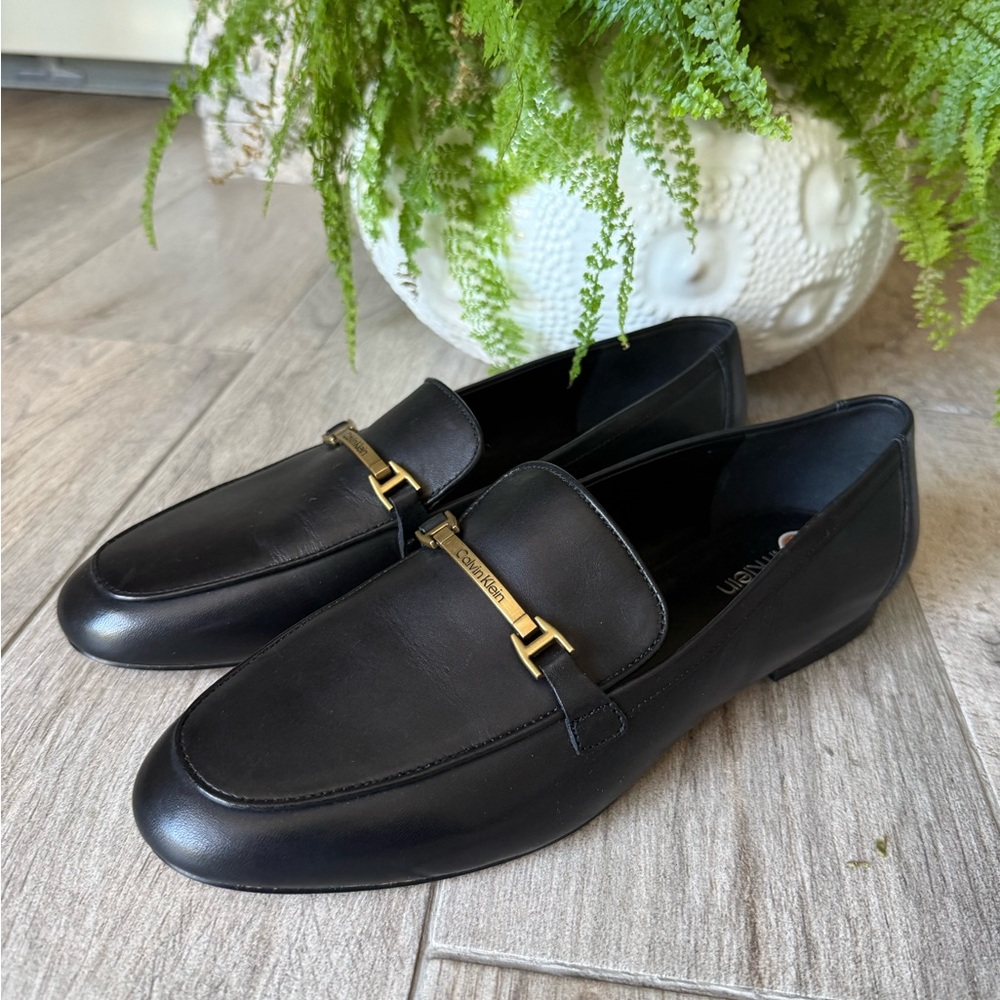 Calvin Klein Women Sommiya Black Leather Loafers with Gold Tone Bit
